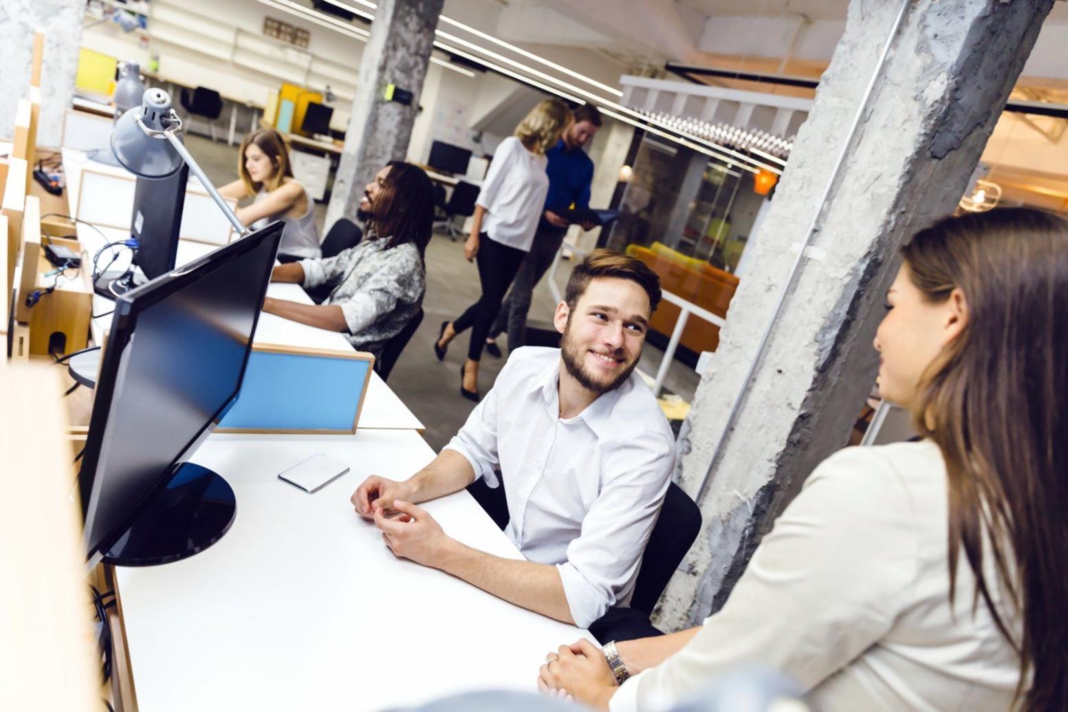 Family reviewing financial documents together at kitchen table