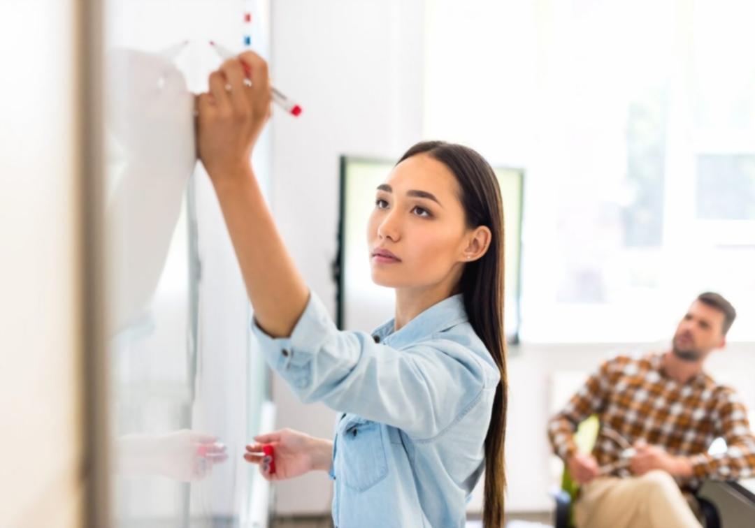 Family reviewing investment documents together at kitchen table