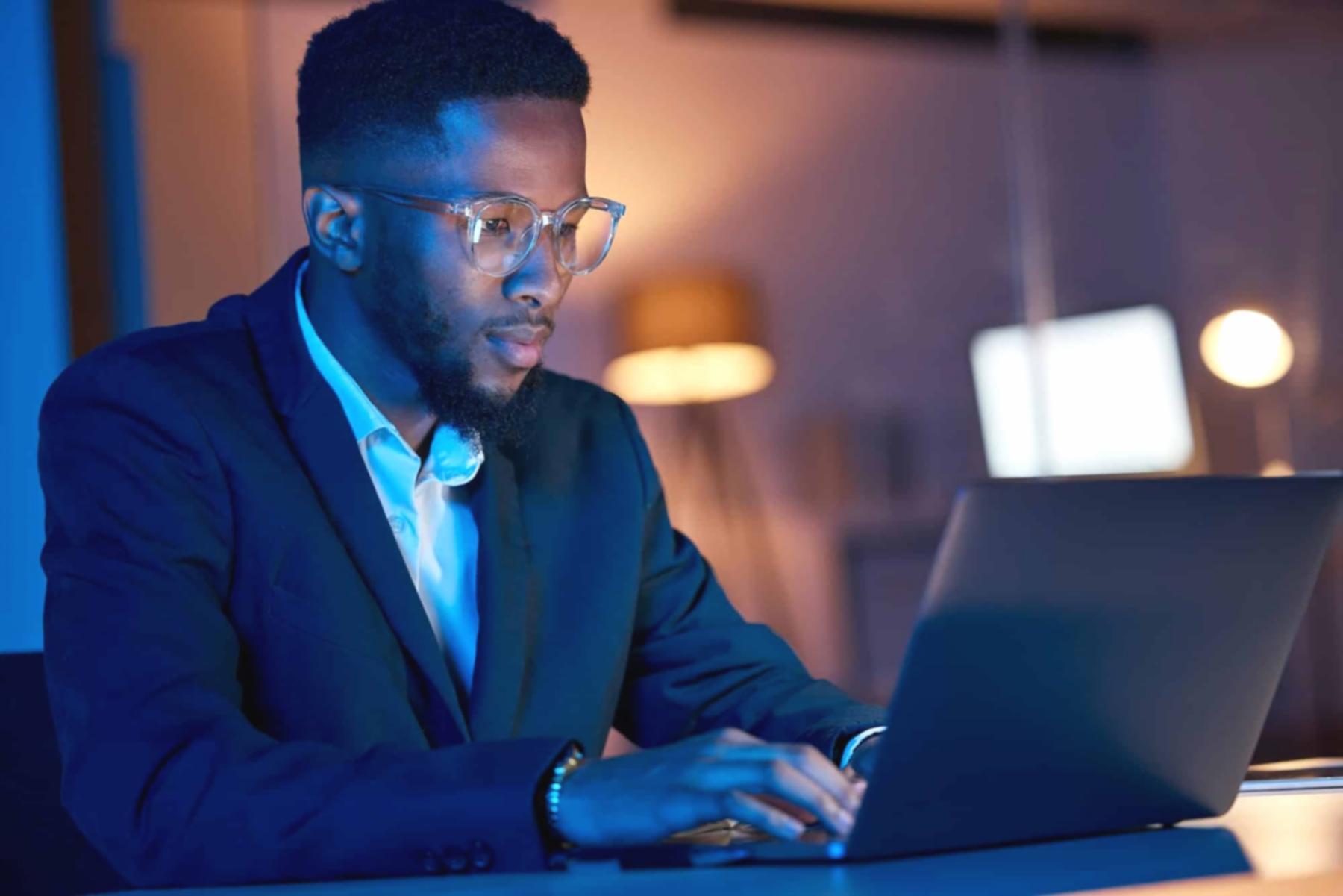 Multi-generational family meeting around dining table with financial charts